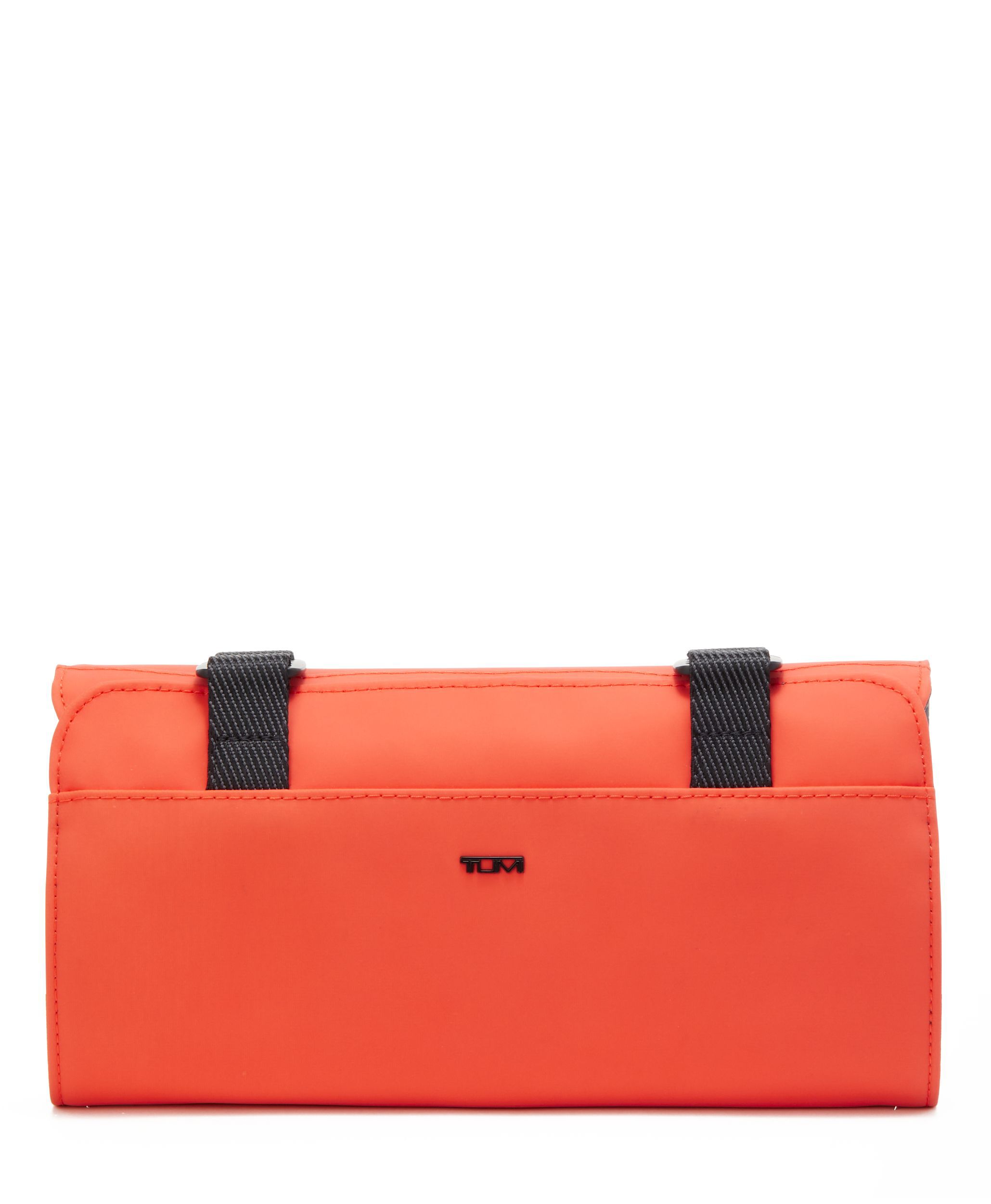 tumi orange luggage