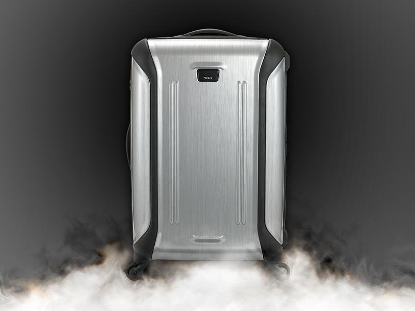TUMI_Stories_Silver_Luggage_in_smoke